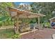 Relaxing gazebo with seating area and a deck at 4626 Ne 7Th St, Ocala, FL 34470