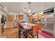 Kitchen with island, stainless steel appliances, and wood cabinets at 4626 Ne 7Th St, Ocala, FL 34470