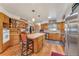 Open kitchen with island and stainless steel appliances at 4626 Ne 7Th St, Ocala, FL 34470