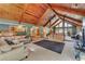 Spacious living room with vaulted ceilings and wood beams at 4626 Ne 7Th St, Ocala, FL 34470