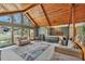Open living area with vaulted ceiling and stained wood beams at 4626 Ne 7Th St, Ocala, FL 34470
