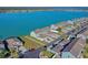 Wide aerial view of the waterfront community at 561 Juniper Springs Dr, Groveland, FL 34736