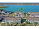 Aerial view highlighting townhome's lakefront location at 561 Juniper Springs Dr, Groveland, FL 34736