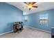 Home office with large windows, offering water views and plenty of natural light at 561 Juniper Springs Dr, Groveland, FL 34736