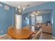 Open dining area with view of living room and kitchen at 561 Juniper Springs Dr, Groveland, FL 34736