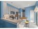 Modern kitchen with gray cabinets and island at 561 Juniper Springs Dr, Groveland, FL 34736