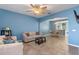 Open living and dining area with neutral decor at 561 Juniper Springs Dr, Groveland, FL 34736