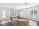 Bright dining room with hardwood floors and chandelier at 10013 Stockbridge St, Clermont, FL 34711