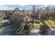 Aerial view showing house, shed and waterfront property at 10285 Ne 218Th Lane Rd, Fort Mc Coy, FL 32134