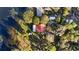 High-angle view of property with red roof building near lake at 10285 Ne 218Th Lane Rd, Fort Mc Coy, FL 32134