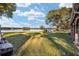 Spacious backyard with lake view and shed at 10285 Ne 218Th Lane Rd, Fort Mc Coy, FL 32134