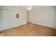 Bedroom with double door closet and hardwood floors at 10285 Ne 218Th Lane Rd, Fort Mc Coy, FL 32134