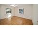 Bright bedroom with wood flooring and ceiling fan at 10285 Ne 218Th Lane Rd, Fort Mc Coy, FL 32134