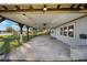 Covered patio with ceiling fan and lake view at 10285 Ne 218Th Lane Rd, Fort Mc Coy, FL 32134