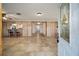 Home entryway with wood walls and tile floors at 10285 Ne 218Th Lane Rd, Fort Mc Coy, FL 32134