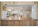 Kitchen with white cabinets, an island, and a pass-through window at 10285 Ne 218Th Lane Rd, Fort Mc Coy, FL 32134