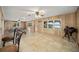 Spacious living room with wood paneling, tile floors, and water views at 10285 Ne 218Th Lane Rd, Fort Mc Coy, FL 32134