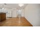 Spacious living room with hardwood floors and access to kitchen at 10285 Ne 218Th Lane Rd, Fort Mc Coy, FL 32134