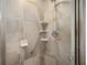 Shower stall with tiled walls and grab bar at 10285 Ne 218Th Lane Rd, Fort Mc Coy, FL 32134