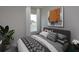 Bright bedroom with a queen-size bed and stylish decor at 13245 Peaceful Melody Dr, Winter Garden, FL 34787