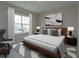 Spacious bedroom with large windows and stylish decor at 13245 Peaceful Melody Dr, Winter Garden, FL 34787