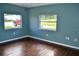 Spacious bedroom with dark hardwood floors at 13619 Lake Blvd, Winter Garden, FL 34787