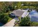 Single-Gathering home on the lake with a dock at 13724 Country Club Dr, Tavares, FL 32778