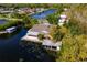 House on lake with dock and boathouse at 13724 Country Club Dr, Tavares, FL 32778