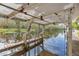 Underside view of a boat lift with wooden planks at 13724 Country Club Dr, Tavares, FL 32778
