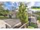 Ranch-style home with carport and private dock access at 13724 Country Club Dr, Tavares, FL 32778