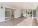 Spacious screened porch with access to the house at 13724 Country Club Dr, Tavares, FL 32778