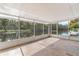 Peaceful screened porch with water views at 13724 Country Club Dr, Tavares, FL 32778