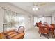 Sunroom with table and chairs, offering plenty of natural light at 14 Aberdeen Cir, Leesburg, FL 34788