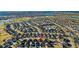 Community overview with golf course and various houses at 1494 Walnut Way, The Villages, FL 32163