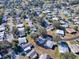 Aerial view of a home in a 55+ community near a golf course at 1611 Cherry Hill Rd, The Villages, FL 32159