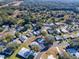 Aerial view of a single Gathering home in a quiet 55+ community at 1611 Cherry Hill Rd, The Villages, FL 32159