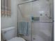 Bathroom with shower stall and toilet at 1611 Cherry Hill Rd, The Villages, FL 32159