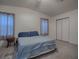 Bright bedroom with a double bed and ample closet space at 1611 Cherry Hill Rd, The Villages, FL 32159