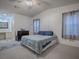 Main bedroom with a double bed and dresser at 1611 Cherry Hill Rd, The Villages, FL 32159