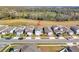 Aerial view of a house located on a tree-lined street at 30224 Armenia Rd, Leesburg, FL 34748