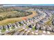Aerial view of a house on a quiet street in a new community at 30224 Armenia Rd, Leesburg, FL 34748