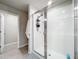 Clean bathroom with a large walk-in shower and glass enclosure at 30224 Armenia Rd, Leesburg, FL 34748
