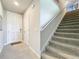 Entryway with stairs, tile floors, and interior doors at 30224 Armenia Rd, Leesburg, FL 34748