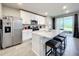 Modern kitchen with stainless steel appliances and an island at 30224 Armenia Rd, Leesburg, FL 34748