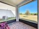 Relaxing screened porch overlooking backyard at 30224 Armenia Rd, Leesburg, FL 34748