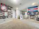 Upstairs hallway with carpeted floor and hockey memorabilia at 30224 Armenia Rd, Leesburg, FL 34748