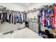 Large walk-in closet with ample hanging space, shelves and drawers at 30224 Armenia Rd, Leesburg, FL 34748