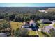 Aerial view of the house and surrounding landscape at 30812 Top Of The Hill Dr, Mount Dora, FL 32757