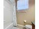 Bathroom with shower/tub combo and toilet at 30812 Top Of The Hill Dr, Mount Dora, FL 32757