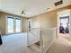 Bright loft with double doors leading to a private balcony at 30812 Top Of The Hill Dr, Mount Dora, FL 32757